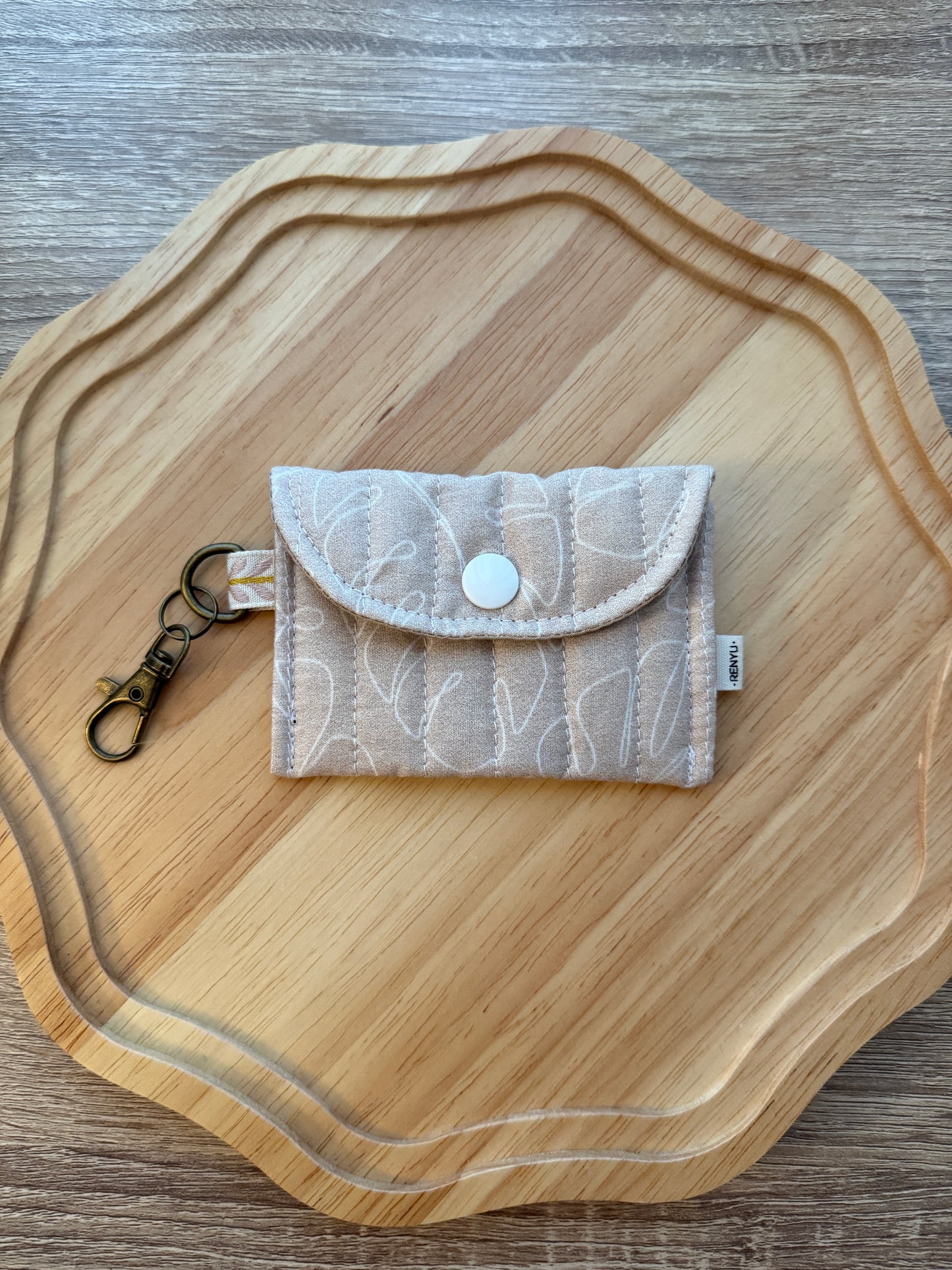 Quilted mini snap pouch